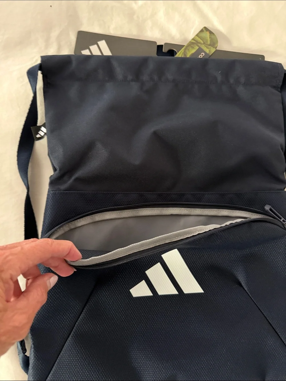 adidas Navy slim Backpack with White Logo and front zipper pocket